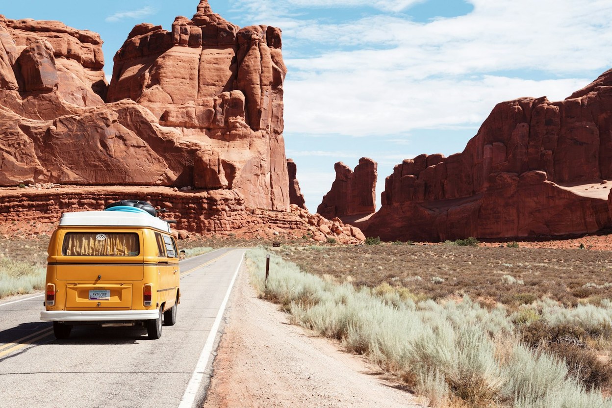 A winding mountain highway — renewal keeps you legal on the road.